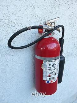 LOT OF 100-UNIVERSAL WALL MOUNT 20 lb. SIZE FIRE EXTINGUISHER BRACKET NEW